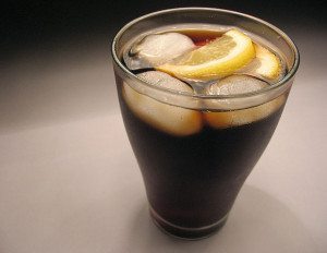 cola may improve the absorption of the drug