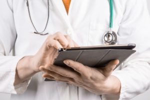 Doctor holding a tablet